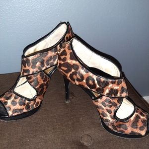 Size 6.5 Michael Kors leopard print heels.